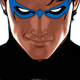 nightwing standing over the city
